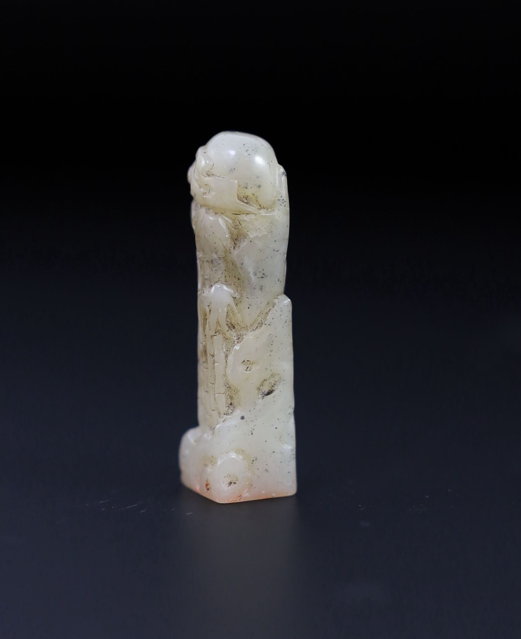 A small Chinese white and grey jade seal, 3.7cm high